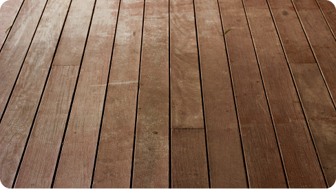 Wood deck boards protected with exterior staining