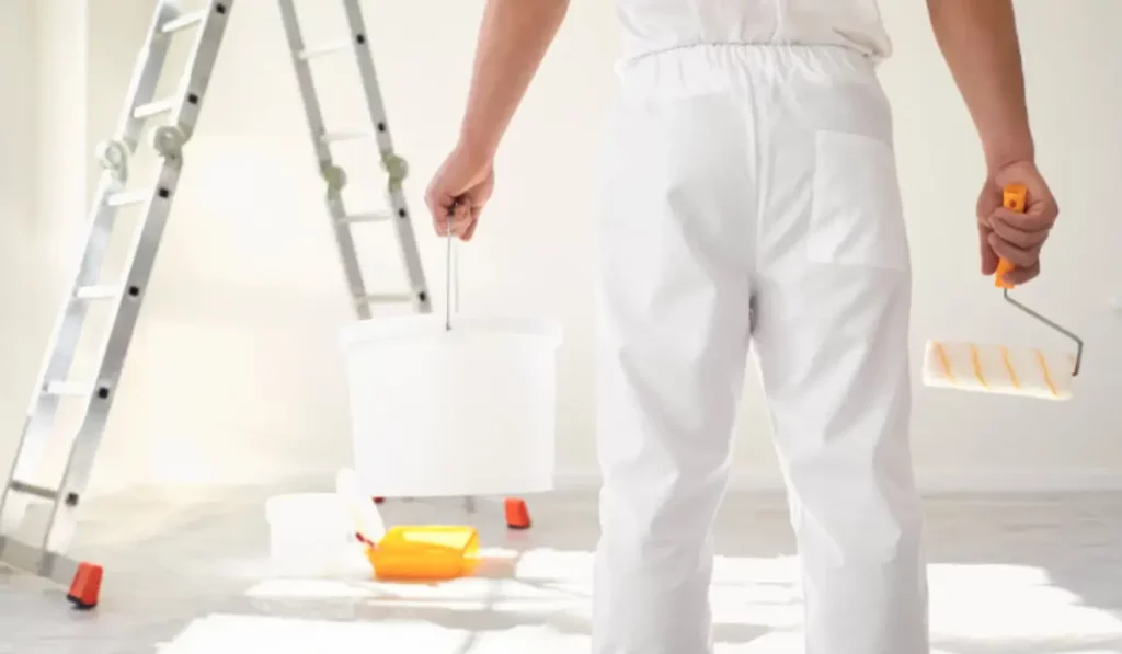 Prep Before Painting setup with tools ready, ladder staged, and professional painter holding supplies.