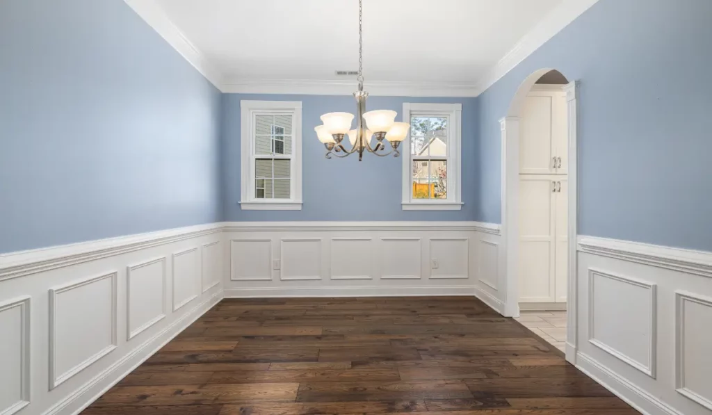 Crown Molding Paint detail showing crisp white ceiling transitions in a Naperville dining room.