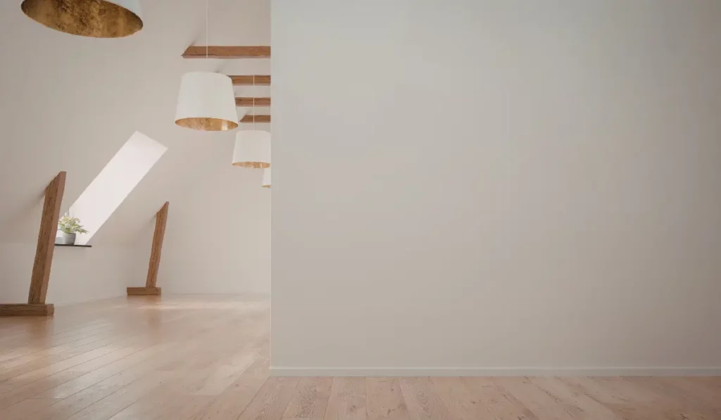 Smooth wall reflecting natural side light evenly across a freshly painted interior in a Naperville home